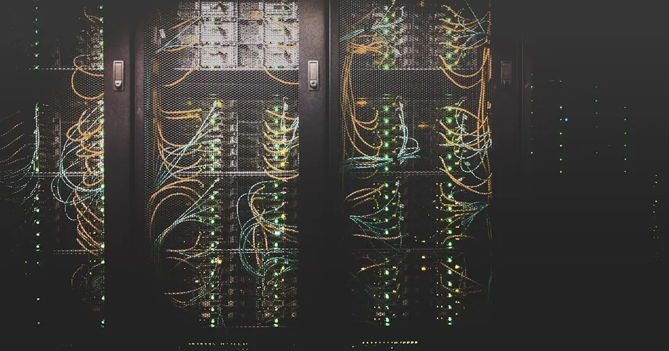 Network cables patched into server hardware with status lights, representing the infrastructure layer behind web-reading agents.