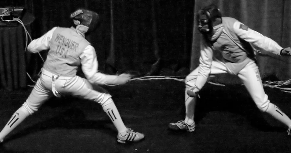 Two fencers mid-bout, wired to a scoring apparatus that registers each touch, an apt metaphor for a security evaluation where the sensors, not the agent, keep score.